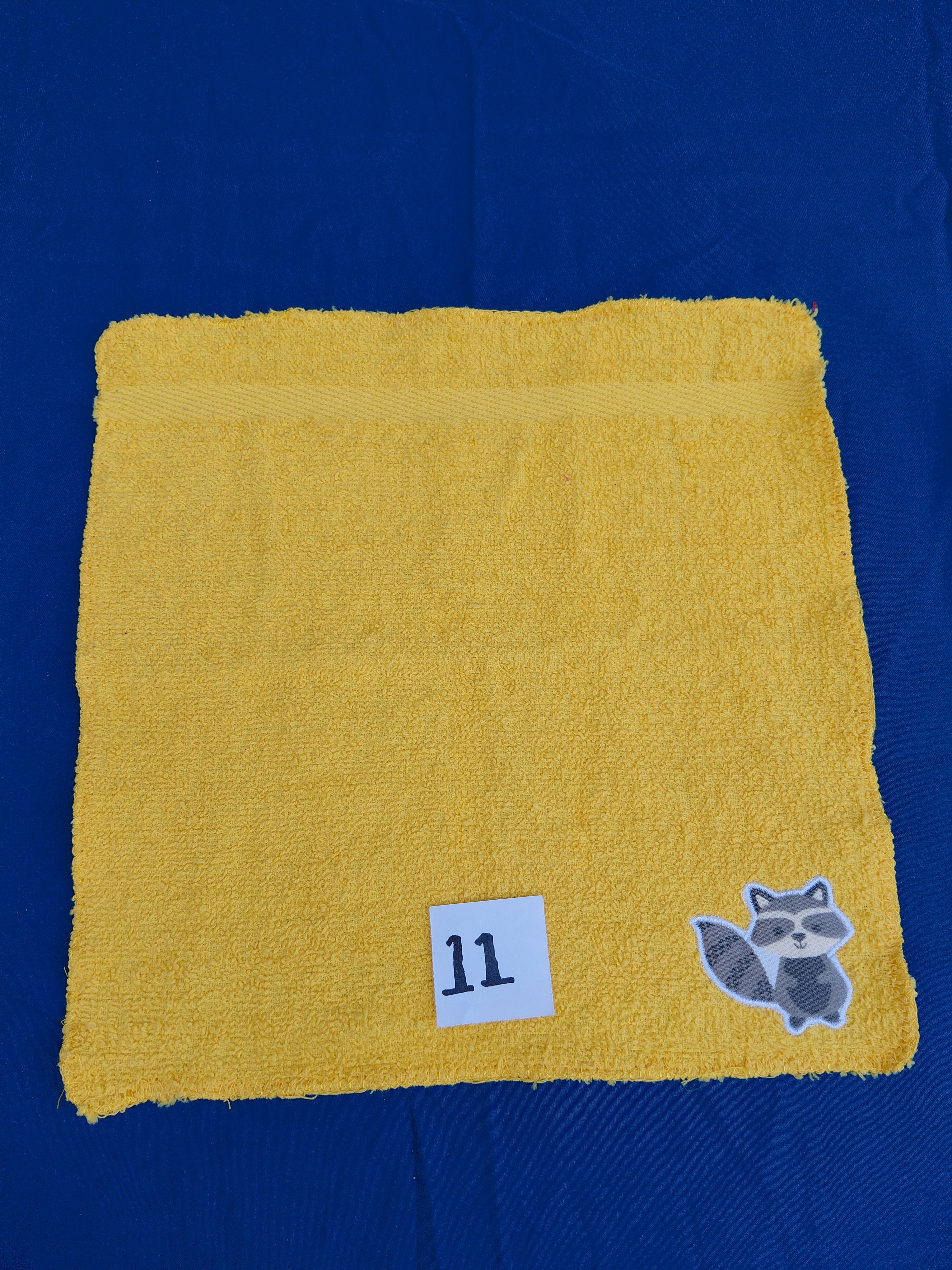 Bright Deep Gold Raccoon Embellished Washcloth